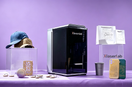 Xlaserlab E3 UV laser engraver marking custom products such as hats, phone cases, paper bags, cups, wood, and metal items