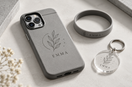 Custom laser engraved phone case, acrylic keychain, and silicone wristband