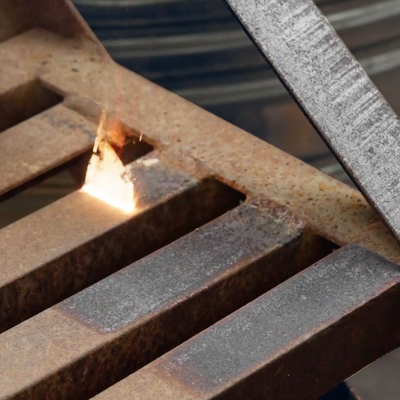 Rust removal on rusted stairs