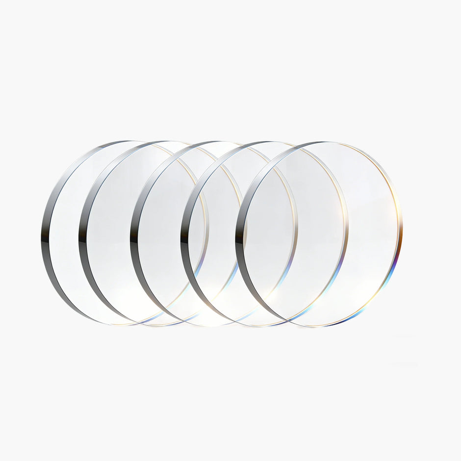 Clear circular lenses with reflective edges, ideal for laser equipment